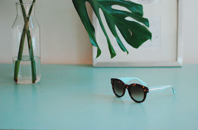 Close-up of sunglasses on table