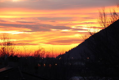 Scenic view of dramatic sky during sunset