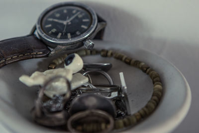 High angle view of clock on table