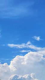 Low angle view of clouds in blue sky