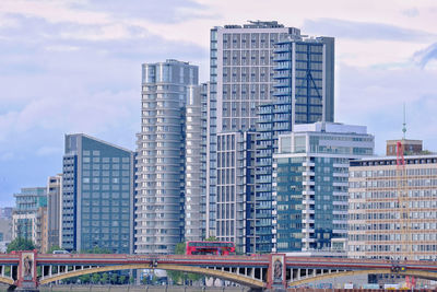 Modern buildings against sky in city