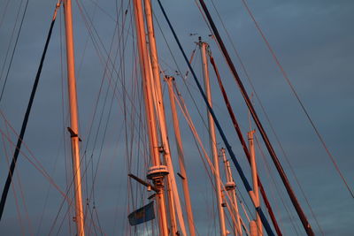 Low angle view of sailboat against sky during sunset