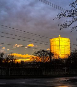 City against sky at sunset