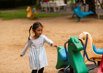 Cute girl playing at playground