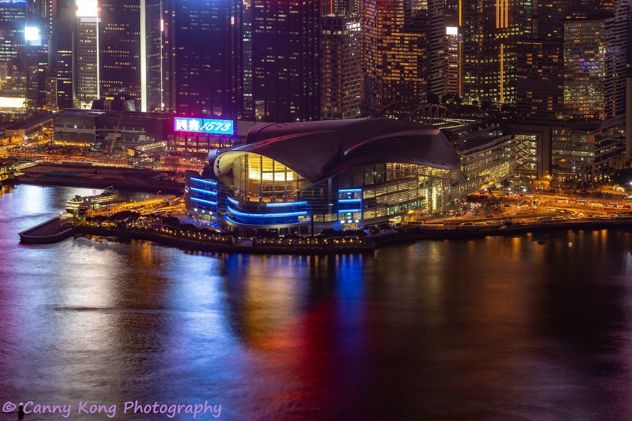 architecture, built structure, building exterior, illuminated, city, night, transportation, water, reflection, connection, building, bridge, no people, waterfront, river, bridge - man made structure, nautical vessel, modern, cityscape, office building exterior, outdoors, skyscraper, financial district