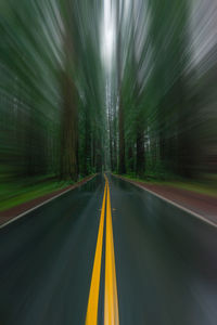 Blurred motion of light trails on road