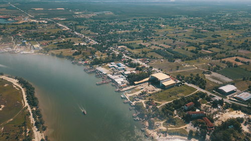 High angle view of river amidst buildings in city