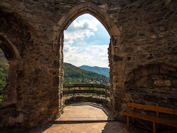 View of old ruin building against cloudy sky