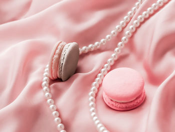 Close-up of wedding rings on table