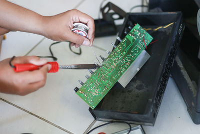 High angle view of person working on table