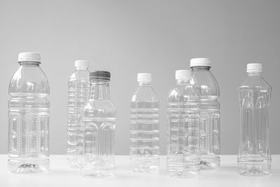 Close-up of wine bottles on table