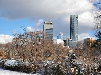 Low angle view of skyscrapers against sky