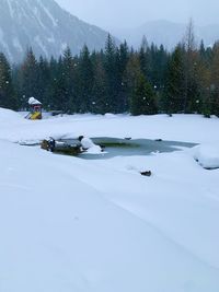 Scenic view of snowcapped mountains during winter