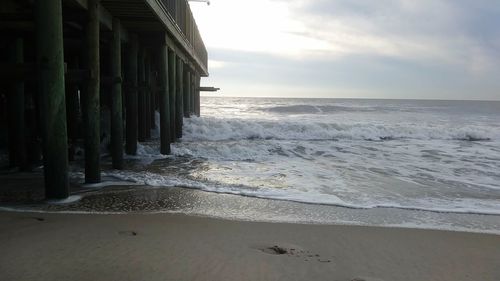 Scenic view of beach against sky