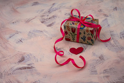 Holiday package with a heart. a handmade gift. gift wrapping.