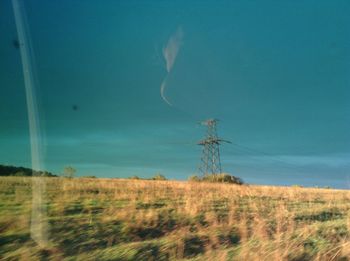 Countryside landscape against blue sky