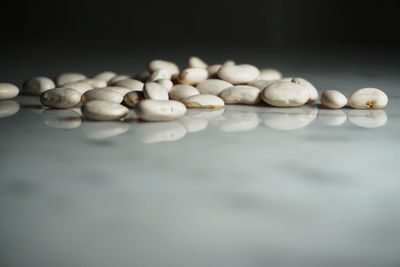 Close-up of beans on marble