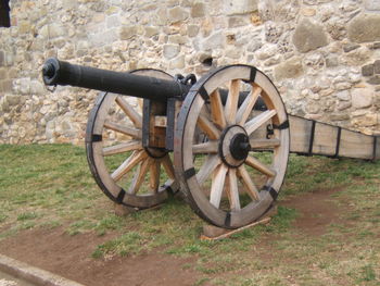 Old fashioned wheel on field