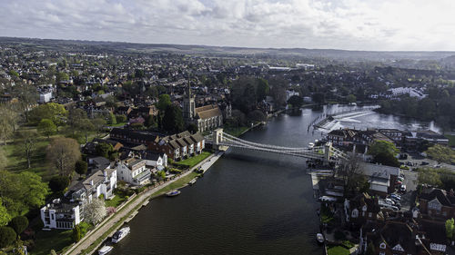 High angle view of river amidst buildings in city
