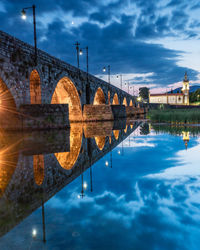 Evening at the medieval bridge at ponte de lima, portugal