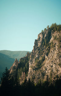 Scenic view of rocky mountains against clear sky