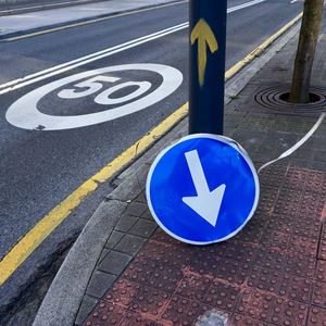 Arrow traffic signal on the street in bilbao city, spain