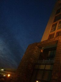 Low angle view of building against sky at night