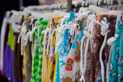 Multi colored cloths for sale in market stall