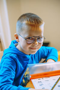 Close-up of boy looking away