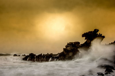 Scenic view of sea against sky during sunset