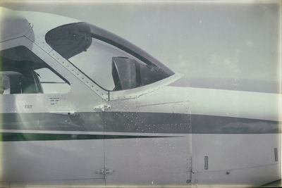 Close-up of wet airplane window