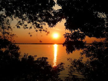 Sunset over calm lake