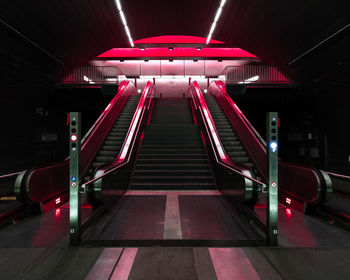 Illuminated escalator in tunnel