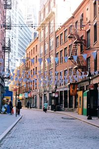 Street amidst buildings in city