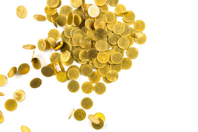 Close-up of coins against white background