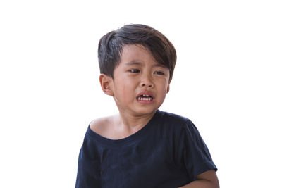 Portrait of boy against white background