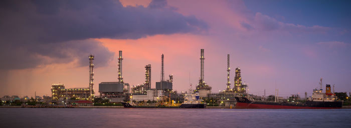 Factory against sky at night