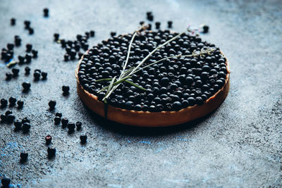 High angle view of black fruits on table