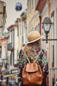 Portrait of woman wearing hat