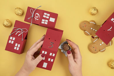 High angle view of man holding christmas decorations