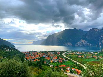 Scenic view of townscape against mountains