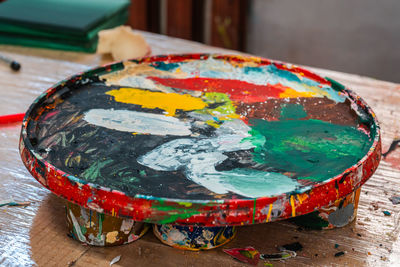 Bright spots of paint in an art workshop