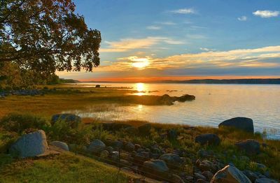 Scenic view of sea against sky during sunset