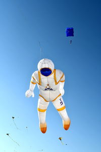 Low angle view of kite flying against clear sky