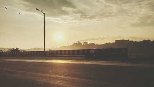 Road against sky during sunset