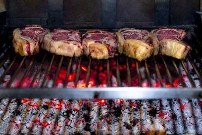 Close-up of meat on barbecue grill