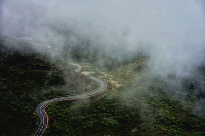 Scenic view of mountains during foggy weather