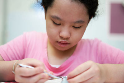 Asia girl learning hobby education in crafting