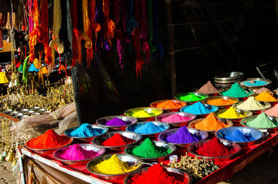 Colorful umbrellas for sale in market