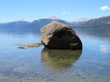 Scenic view of lake against mountain range